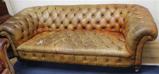 A buttoned leather Chesterfield settee, W.190cm
